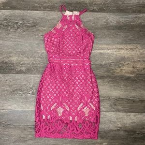 Fuchsia lace dress with nude under skirt and high neck